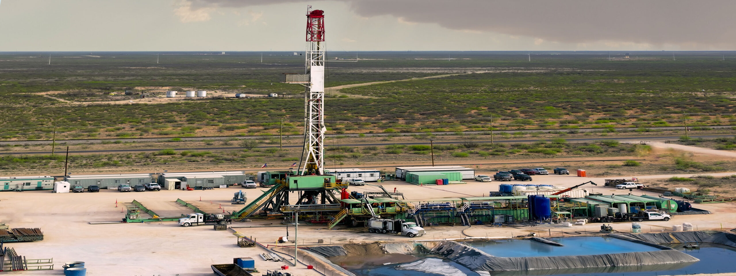 Aerial image of fracking well wastewater retention ponds.