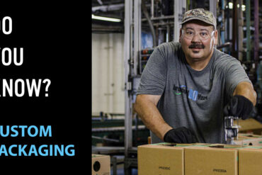 Close-up of Brainerd Chemical employee custom-labeling boxes for blind shipment.